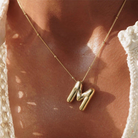 Irena – Collana dorata con charme a forma di iniziale