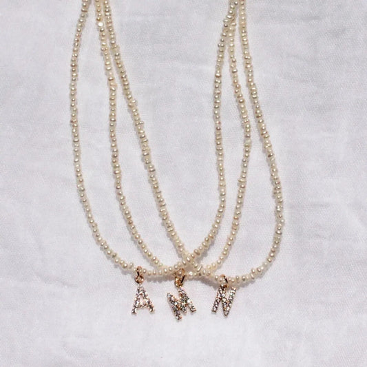 Miriam – Collana dorata doppia con pendente