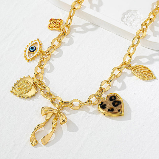 Lena – Collana dorata con dettagli in pietra