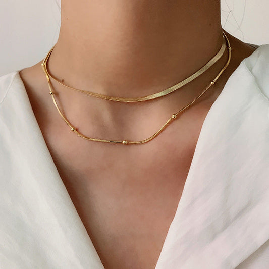 Klara – Collana dorata semplice a doppio strato con lucentezza moderna
