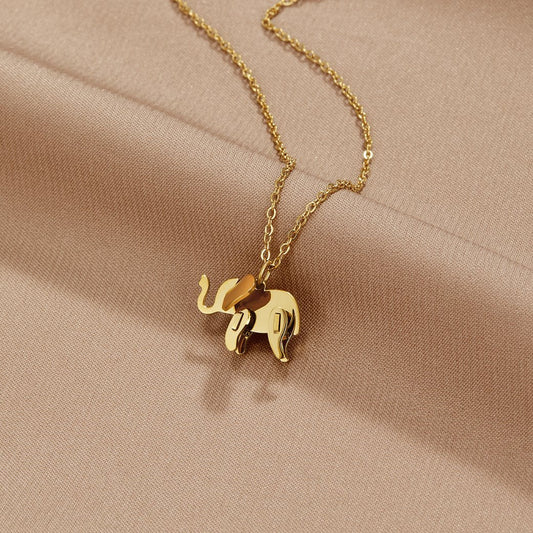 Luisa – Collana dorata con elementi floreali simmetrici