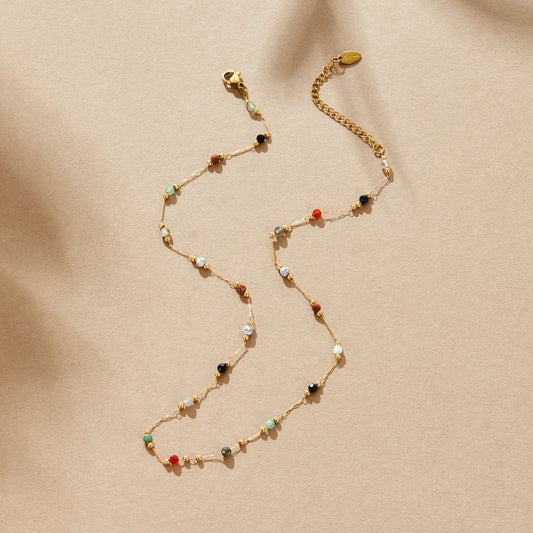 Helmina – Catena in oro colorato con dettagli in smalto.