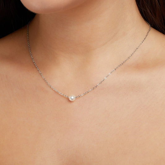 Clara – Collana dorata con pendente rotondo