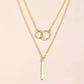Dorina - Golden necklace with delicate pendant