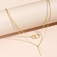 Dorina - Golden necklace with delicate pendant
