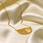 Eleonora – Collana dorata con pendente ampio