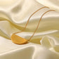 Eleonora – Collana dorata con pendente ampio