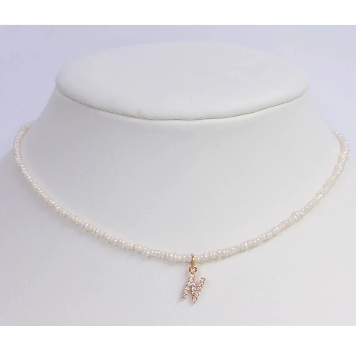 Miriam – Collana dorata doppia con pendente