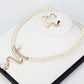 Set collana e orecchini con perle naturali