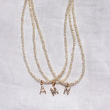 Miriam – Collana dorata doppia con pendente