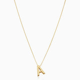 Jutta – Golden necklace with a clear linear structure