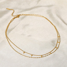 Helena – Collana dorata discreta dal fascino geometrico