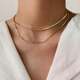 Klara – Collana dorata semplice a doppio strato con lucentezza moderna