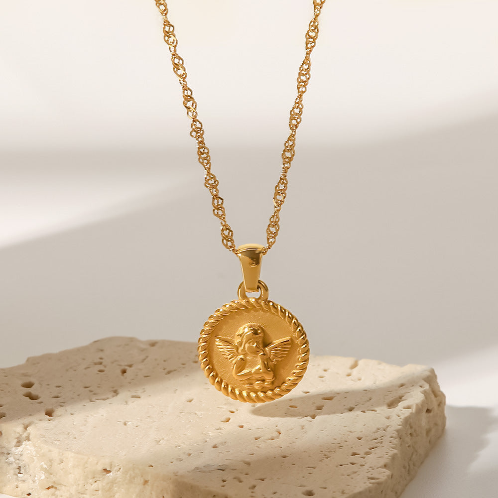 Elisabeth – Collana dorata con piccoli pendenti simbolici