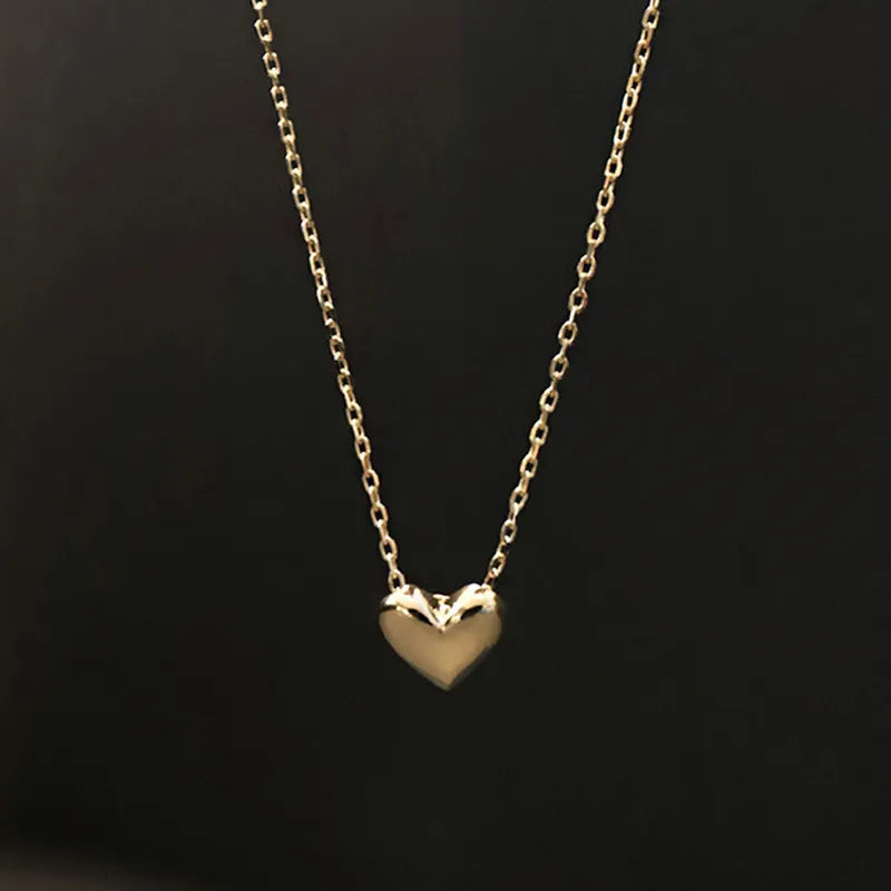 Klara – Collana dorata con pendente rotondo