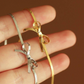Rebecca - Collana dorata con pendente a forma di iniziale