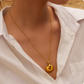 Annika – Collana dorata con pendente rotondo