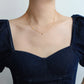 Carina – Collana dorata con accenti colorati