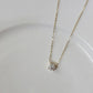 Rafaela – Collana in argento placcato oro 18K con zircone
