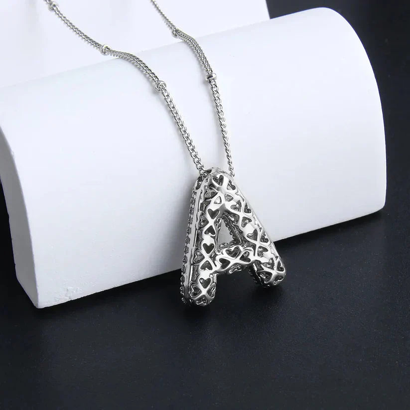 Collana con ciondoli a forma di lettere