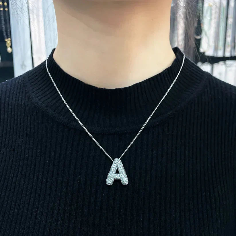 Collana con ciondoli a forma di lettere
