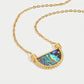 Nadja – Collana dorata con pendente in cristallo