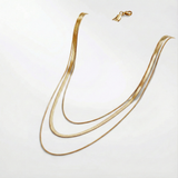 Antonie – Collana in oro multistrato dalla struttura trasparente.