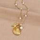Livia – Collana dorata con pietra a forma di goccia