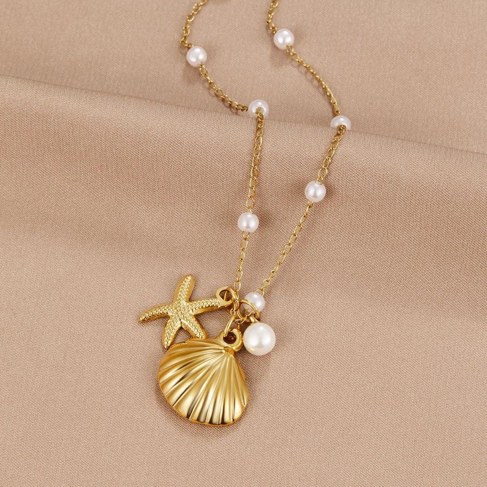 Livia – Collana dorata con pietra a forma di goccia