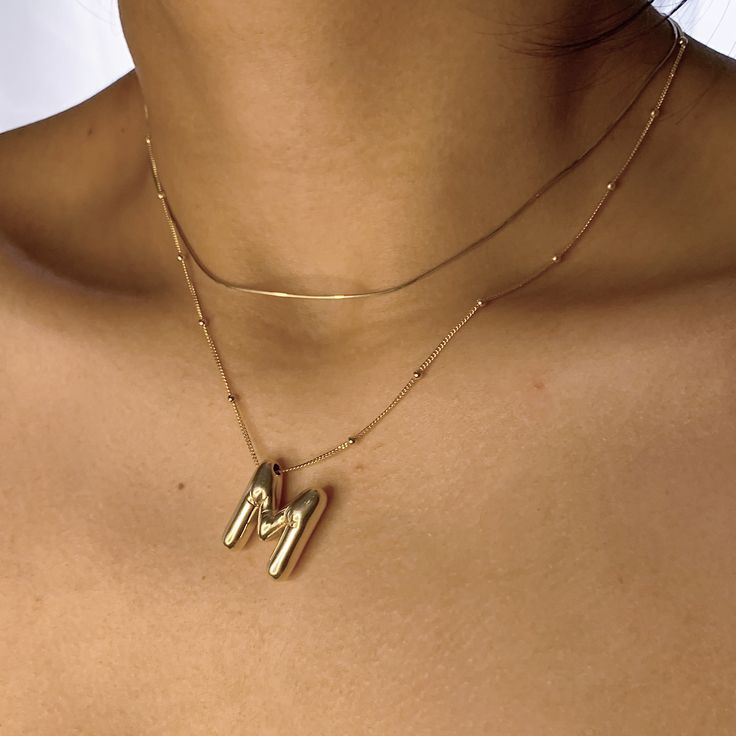 Irena – Collana dorata con charme a forma di iniziale