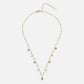 Marta – Collana dorata con pendente verde