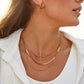 Antonie – Collana in oro multistrato dalla struttura trasparente.