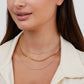 Antonie – Collana in oro multistrato dalla struttura trasparente.