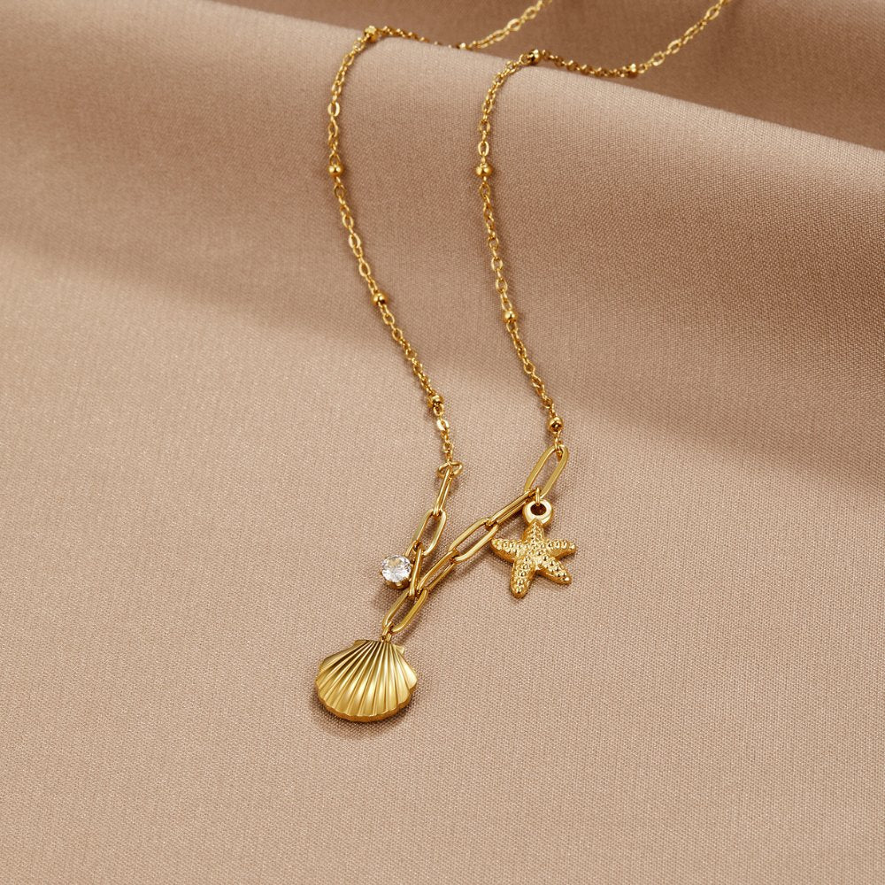 Anja – Collana dorata con decorazione in perla