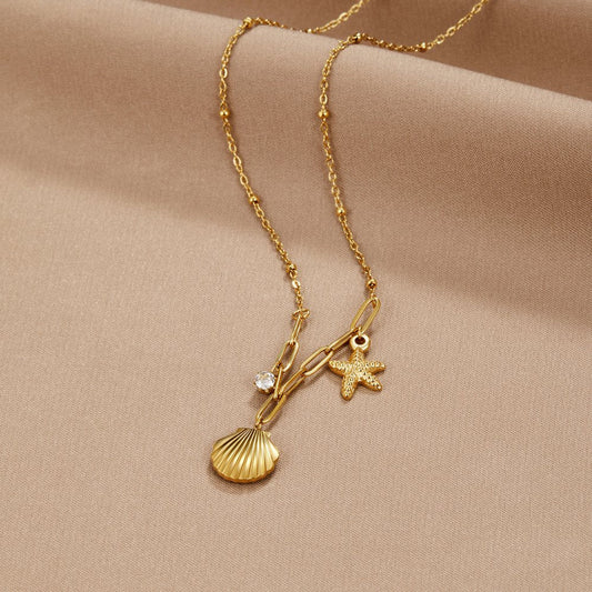 Anja – Collana dorata con decorazione in perla