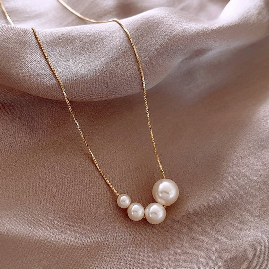Gerda – Collana dorata con cuore in rilievo