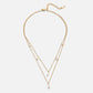 Tanja – Collana a strati in oro con maglia moderna.