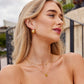 Leona – Collana dorata doppia con pendente rotondo