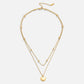Annalena – Doppia catena in oro con pendente.