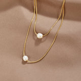 Nora – Collana dorata dal design a catena