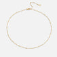 Sabina – Collana girocollo in oro fino con mini-perle.