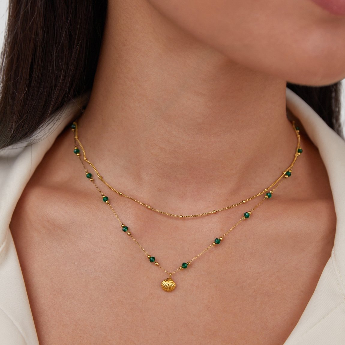 Fiona – Collana dorata con mini charm