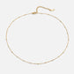 Fiona – Collana dorata con mini charm