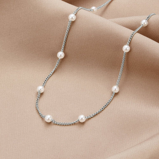 Johana – Collana dorata con pendente floreale
