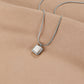 Silvie – Collana dorata con mini placchette